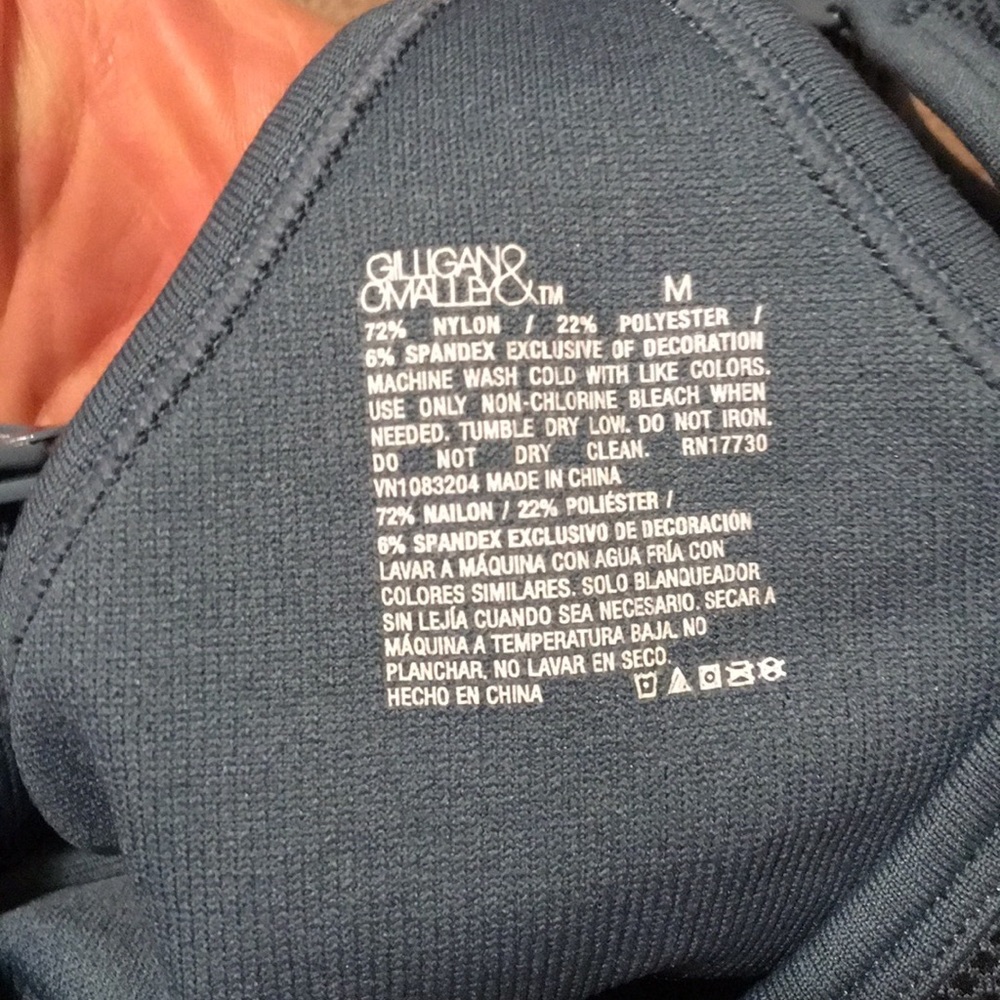 Two nursing bras. A Blue and a black